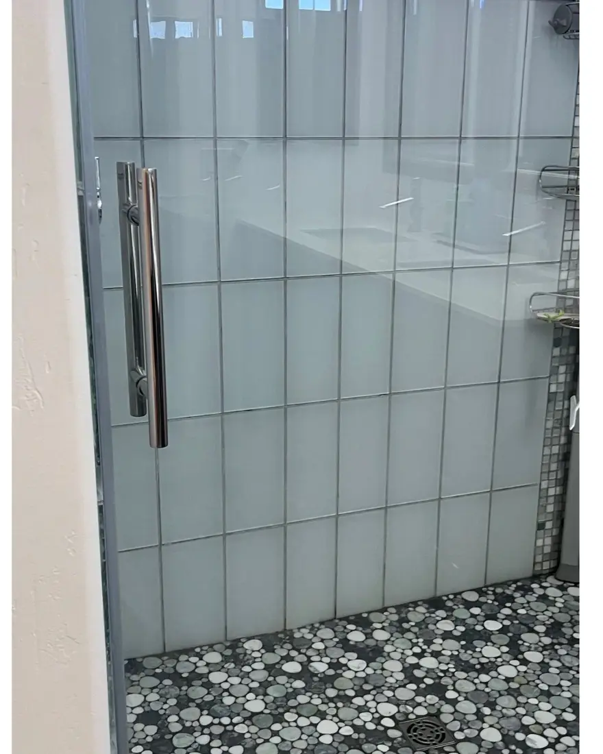 Glass shower, pebble floor, after
